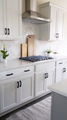 the instagram page on instagram com shows an image of a kitchen with white cabinets and