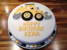 a birthday cake with a tractor on it