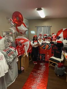 a room filled with lots of red and white items