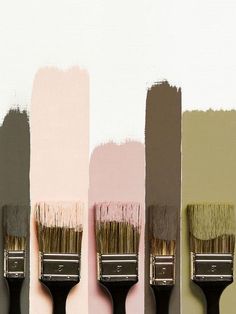 four paintbrushes with different shades of pink, brown, and black on them