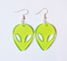 A pair of neon green alien earrings ♡ Each alien charm is 4cm  Comes with rubber earring backs Green Plastic Earrings For Gifts, Neon Yellow Drop Earrings As A Gift, Green Dangle Novelty Jewelry, Green Novelty Dangle Jewelry, Fun Neon Earrings For Gifts, Green Hypoallergenic Novelty Earrings, Green Plastic Jewelry For Gifts, Green Fun Plastic Jewelry, Fun Green Plastic Jewelry