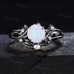 Opal rings sparkle in thousands of scintillating hues, and each stone holds a mystery that inspires curiosity, leading some to call it the most fascinating gemstone on earth. Each opal ring is a mystical game and pure eye candy. So using it as a promise to your lover, friends or family to bring them love and good fortune is a very romantic choice. INSPIRATION GIFTS CHOICE : This Moonstone ring comes in a delicate jewelry box, it is a good choice of an anniversary, engagement, birthday, Mother's day gifts, Christmas day, thanksgiving day, valentines day gift for couple, friend, family . It is also a gift for someone who believes in the healing powers of gems. 30 DAYS MONEY-BACK GUARANTEE: I have confidence on my jewelry. 30 days money-back guarantee and for any reason, you are not satisfied Spiritual Promise Rings, Black Opal Engagement Ring, White Opal Engagement Ring, Moonstone Wedding Ring, Gothic Wedding Rings, Opal Engagement Ring Set, Saratoga Springs Ny, Cute Engagement Rings, Future Engagement Rings