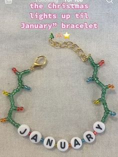 a bracelet with the word january written on it