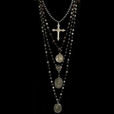 The Hematite Sacred Heart Cross Necklace features 17" of smooth 8mm Hematite and our signature Sacred Heart Cross. Hematite helps to absorb negative energy and calms in times of stress or worry. Hematite is a very protective stone and is great to carry to help you stay grounded in many situations. The French cross with the Sacred Heart on one side and a Lily at the center of the back side is the focal point. It meets in the back with a decorative toggle clasp. Length: 17" Gemstones: 8mm Hematite Guadalupe Necklace, Heart Cross Necklace, Dream Items, Cristo Rey, Edgy Jewelry, Saint Michael, Stay Grounded, Our Lady Of Guadalupe, Lady Of Guadalupe