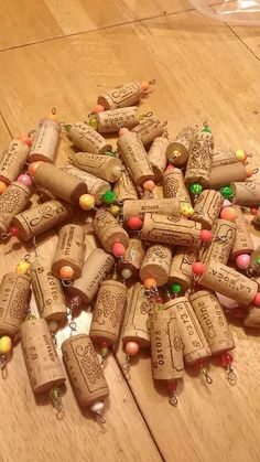 there are many wine corks on the floor and one is filled with candies