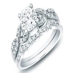 a white gold engagement ring set with diamonds