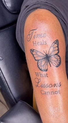 a person with a tattoo on their arm that says time heals what lessons cannot