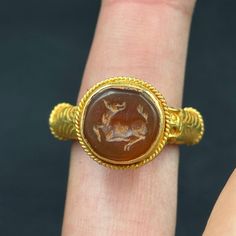 Amazing 18k Rare indo-Greek ancient piece carnelian with animal figure carved signet gold ring intaglio Ancient Style Yellow Gold Signet Ring Gift, Ceremonial Yellow Gold Intaglio Jewelry, Ancient Intaglio Ring Jewelry, Antique Intaglio Signet Ring Collectible, Ancient Yellow Gold Intaglio Ring, Animal Figures, Animal Figurines, Signet Ring, Rings Statement