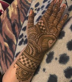 a henna on someone's hand is shown