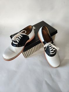 Great vintage condition, never worn!  Size 7.5 vintage 19" insole Ball of foot 3" 3/4" heel height Leather 1950s Saddle Shoes, Retro Low-top Oxfords With Leather Sole, Retro Black Oxfords With Round Toe, Retro Black Round Toe Oxfords, Retro Sneakers With Leather Sole And Round Toe, Retro White Cap Toe Oxfords, Retro Black Cap Toe Oxfords, White Lace-up Vintage Oxfords, Vintage White Lace-up Oxfords