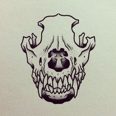 a black and white drawing of a skull with teeth