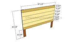 a wooden bed frame with measurements for the headboard