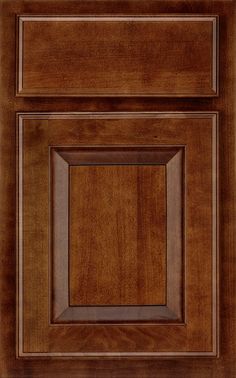 a wooden cabinet door with square and rectangle design