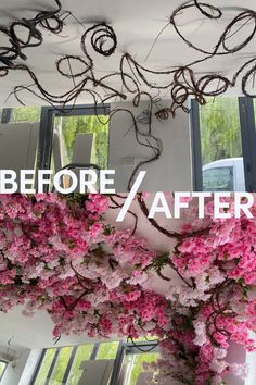 pink flowers are hanging from the ceiling in front of a mirror with words before / after