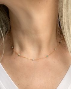 Elevate your everyday style with this dainty green aventurine necklace. Delicately handcrafted with tiny green beads, this boho-inspired piece is the perfect addition to your jewelry collection. The stunning green aventurine crystal is known for its calming and balancing properties, making it not only a beautiful accessory but also a meaningful gift idea for her. Finished with 14k gold filled or sterling silver accents, this handmade necklace exudes elegance and sophistication. Perfect for layer Dainty Green Adjustable Choker, Green Dainty Jewelry With Tiny Beads, Dainty Green Jewelry With Tiny Beads, Dainty 14k Gold Filled Necklace For May Birthstone, Delicate Green Necklace With May Birthstone, Dainty 14k Gold Filled Necklace With May Birthstone, Delicate Green May Birthstone Necklace, Dainty Adjustable Green Crystal Necklaces, Dainty Adjustable Green Crystal Necklace