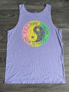 A SWEET vintage tank. Beautiful rainbow neon yin yang graphic. LIghtly worn. EXCELLENT condition. Check out other sensational vintage tees in my shop https://www.etsy.com/shop/sweetVTGtshirt Label: Royal. USA Made Measurements (inches): Pit to Pit: 20 1/2 Bottom Hem: 21 Shoulders: 12 1/2 Total length: 29 1/2 Size: Fits like an adult Medium. Tag reads Large. Please see measurements for most accurate sizing. Please note that pieces are measured while laying flat. Please double where appropriate. T Sleeveless Multicolor Graphic Print T-shirt, Casual Printed Tank Top, Casual Graphic Print Tank Top For Streetwear, Casual Racerback Top With Graphic Print, Casual Screen Print Tank Top, Casual Crew Neck Tank Top With Graphic Print, Casual Cotton Tank Top For Festivals, 90s Graphic Print Crew Neck Tank Top, Purple Graphic Print Sleeveless Tops