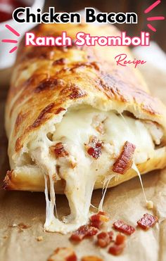 chicken bacon ranch stromboli recipe on a piece of parchment paper with text overlay