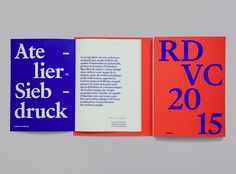 three books with different font and numbers on the covers, one in blue and red