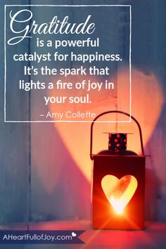 a lantern with a heart on it and the words, grateful is a powerful catalyst for happiness it's the spark that lights a fire of joy in your soul