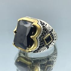 Introducing our Men's Black Onyx Square Stone Handmade Silver Ring, a classic and elegant piece of jewelry crafted with precision and care. This timeless ring is made from high-quality 925 sterling silver, ensuring both durability and style. Whether you're dressing up for a special occasion or simply adding a touch of sophistication to your everyday attire, this ring is the perfect choice. Key Features: Stone: The centerpiece of this ring is a stunning square-cut black onyx stone. Black onyx is not only visually striking but also symbolizes strength and protection. Its deep black hue adds a touch of mystery and elegance to your look. Handmade: Each ring is meticulously handcrafted by skilled artisans, ensuring a unique and one-of-a-kind piece of jewelry. Our commitment to quality craftsman Elegant Stone-set Signet Ring For Formal Wear, Classic Signet Ring With Stone Setting As Gift, Classic Signet Ring With Stone Setting For Gift, Elegant Signet Ring With Stone Setting For Formal Occasion, Elegant Formal Signet Ring With Stone Setting, Elegant Formal Signet Ring Stamped 925, Elegant Signet Ring With Stone Setting For Anniversary, Classic Signet Ring With Stone Setting For Formal Occasions, Classic Formal Signet Ring With Stone Setting