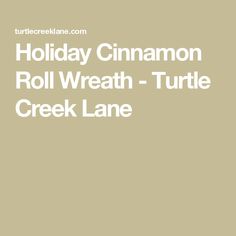 the words holiday cinnamon roll wreath - turtle creek lane are in white on a tan background