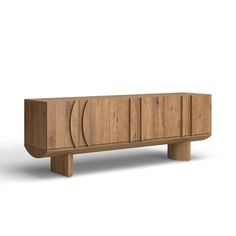 the sideboard is made out of wood and has four circles on each side, along with