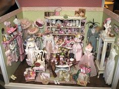 a doll's house with lots of dolls in it