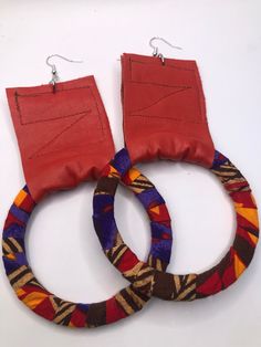 This listing is for a pair of mixed media earrings that are made of leather, fabric and wood. They are approximately 4.5 inches long. Very lightweight. Fabric Hoop Earrings, Leather Hoop Earrings, Art Earrings, Handcrafted Earrings, African Fabric, Leather Fabric, Top Selling, Jewelry Ideas, Handmade Earrings