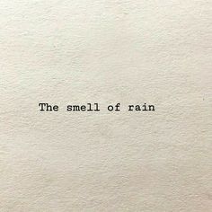 an old typewriter with the words the smell of rain printed on it's paper