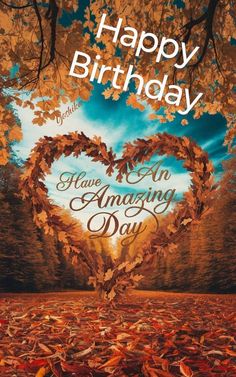 a happy birthday card with an image of a heart shaped tree in the fall leaves