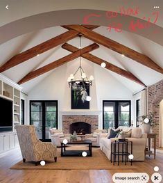 a living room filled with furniture and a fire place in the middle of a room