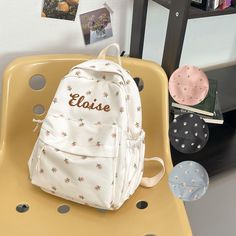 ✦ Production Time: 8-10 business days ✦ Shipping Time: USPS Ground/3-5 business days, USPS Priority/1-3 business days Whether it's a day at school, a playdate with friends, or a family outing, this backpack is ready to be your child's reliable and charming companion. ✦ Perfectly Sized: 12''-9.5''-4.5'' It's spacious enough to hold books, toys, snacks, and everything they need for their adventures. ✦ Vivid Colors: Whether it's the simplicity of White, the serenity of Blue, the playfulness of Pink, or the classic appeal of Black, there's a shade to match every personality. ✦ Thoughtful Pockets: Stay organized on the go with this backpack's well-designed pockets and compartments. ✦ Versatile Functionality: From being a Toddler Backpack for daycare to serving as a Backpack for kids during scho White School Bags With Letter Embroidery, Casual Embroidered Backpack For Students, Embroidered Everyday Bags For Back To School, Back To School Everyday Embroidered Bags, Casual Embroidered Student Backpack, School Backpack With Letter Embroidery, Preppy Backpack For School Events, Embroidered Backpack For Everyday And Back To School, Backpack With Letter Embroidery For Everyday Use