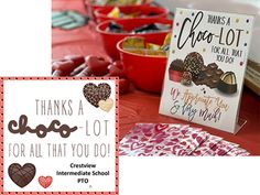 there is a sign that says thanks to all the chocolates in the box on the table