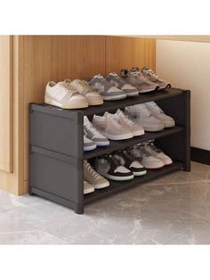 there are many pairs of shoes on the shelf