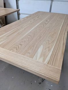 a table made out of wood in a garage