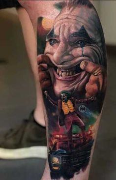 a man's leg with an image of a clown and his car on it