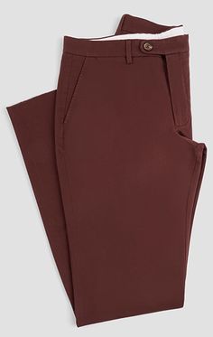 One of our bestselling products, our signature chinos are a classic item that can be worn year-round. The sturdy burgundy cotton twill fabric is the perfect all-season weight and will break in for a personalized fit over time. Similar to our dress trousers, the contoured waistband ensures that our chinos will sit comfortably on your waist throughout the day. A wardrobe essential, these can be worn with everything from a t-shirt or polo to a button-up shirt and sport coat. Fall Chino Cotton Twill Chinos With Welt Pockets, Classic Chinos With Straight Hem For Fall, Brown Cotton Chinos For Workwear, Classic Fall Chinos With Straight Hem, Classic Chinos For Fall, Classic Fall Chinos, Classic Brown Cotton Chinos, Formal Fall Chinos, Classic Brown Chinos For Work