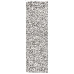 a gray rug with small white dots on the bottom and one long, narrow area