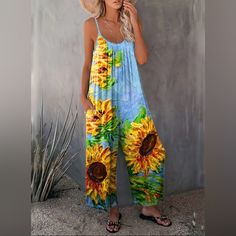 Boho Sunflower Print Sleeveless,Wide Leg, Comfortable Fit Jumpsuit Size: Various Sunflower Print Blue White Wide Leg Polyester Elastane Machine Wash New In Package Black Jumpsuit Outfit, Loose Fit Jumpsuit, Womens Jumpsuits Casual, Corak Bunga, Boho Jumpsuit, Pocket Jumpsuit, Floral Print Jumpsuit, Loose Jumpsuit, Print Jumpsuit