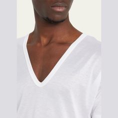 Zimmerli T-shirt features a deep V-neckline Approx. 29.72"L from shoulder to hem Short sleeves; approx. 8.7"L Pullover style Straight hem Classic fit Cotton Made in Switzerland Classic V-neck T-shirt For Spring, Deep V Neck, Deep V, Pullover Styling, Switzerland, V Neck T Shirt, Tops Designs, Short Sleeves, V Neck