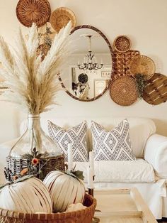 a living room filled with lots of furniture and decor on top of a wooden table