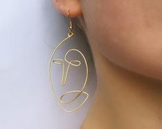 Large Moon Earrings Gold Moon Face Jewelry Big Brass Circle | Etsy Elegant Moon-shaped Metal Earrings, Elegant Brass Earrings With Moon Charm, Festival Moon-shaped Brass Earrings, Silver Moon-shaped Brass Earrings, Mystical Moon-shaped Brass Earrings, Crescent Earrings, Face Jewellery, Moon Face, Abstract Earrings