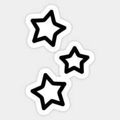 three star stickers on a white background with black outlines in the shape of stars