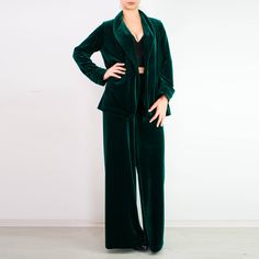 "Take an effortlessly cool approach to the new season with a pair of sophisticated, wide leg, floor length pants. Elasticated waist. Emerald green plush velvet. Extremely comfortable palazzo pants. Contemporary silhouette High waist -------------------------- This garment is available in XS-2XL sizes Every garment is made for 170 cm (5\"8') total height. We will be happy to customize it for you. Just send your personal measurements and height in \"message to seller\" box when ordering. SIGN UP T Green Wide Leg Pants For Fall, Green High-waisted Wide Leg Pants For Fall, Green Wide Leg Pants For Loungewear, Green Wide Leg Pants For Loungewear In Fall, Green Wide Leg Pants For Fall Loungewear, Green Wide Leg Pants For Evening, Chic Green Wide Leg Pants For Loungewear, Green Wide Leg Full Length Pants For Loungewear, Green Wide Leg Full Length Pants For Party