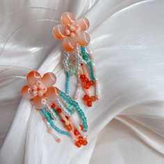 Style: Retro Material: Others Color: Peach Jade Flower Tassel Ear Studs Bohemian Beaded Flower Earrings For Spring, Spring Bohemian Beaded Flower Earrings, Bohemian Beaded Drop Earrings For Spring, Bohemian Pink Earrings For Spring, Pink Bohemian Earrings For Spring, Bohemian Spring Beaded Drop Earrings, Bohemian Orange Jewelry For Spring, Orange Drop Earrings For Spring, Orange Earrings For Spring Gift