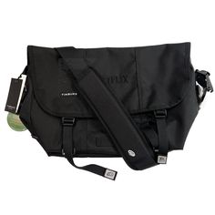 Timbuk2 Netflix Classic Messenger Bag Eco Black Classic Black Camera Bag For Everyday Use, Classic Black Everyday Camera Bag, Classic Black Camera Bag For Everyday, Classic Black Shoulder Camera Bag, Black Bag With Removable Pouch For Commuting, Black Commuter Bag With Removable Pouch, Black Bag For Commuting, Black Commuting Bag With Removable Pouch, Black Bags For Commuting