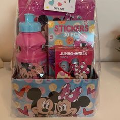 a box with mickey and minnie mouse items in it