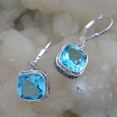 Swiss Blue Topaz Ornate fancy Design Earrings Stone color and size is very good. all handmade in bali. great value Length 1.06 inch approx Stone Size 9mm approx 🎁Great as a gift for yourself or someone else. Free Gift Packaging -- just let us know! Please message us with any questions -- we are happy to help!! 💙Blue Topaz Metaphysical Properties 💙 Inspires creativity 💙 Promotes calm and aids in meditation 💙 Increases psychic abilities 💙 Helps with focus and attention span 💙 Stimulates con Fancy Design, Earrings Stone, Attention Span, Birthstone Earrings, Blue Topaz Earrings, Garnet Jewelry, Garnet Earrings, Peridot Gemstone, Topaz Earrings