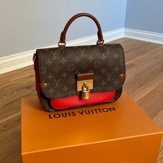 This Is An Authentic Louis Vuitton Monogram Vaugirard In Coquelicot. The Bag Is Crafted Of The Iconic Monogram Canvas With A Red Leather Front Pocket And Sides. The Bag Features An Adjustable Shoulder Strap, Polished Gold Hardware, And A Brown Rolled Leather Handle. The Front Flap Opens To A Partitioned Red Microfiber Interior With A Central Flat Compartment. Base Length: 10.25 In Height: 6.75 In Width: 3.50 In Drop: 3.50 In Drop: 12.50 In Drop: 20.50 In Comes With Dust Bag Strap Box Bag Straps, Monogram Canvas, Authentic Louis Vuitton, Leather Handle, Gold Hardware, Red Leather, Louis Vuitton Monogram, Louis Vuitton Bag, Front Pocket