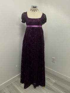 Beautiful dark purple lace over lilac polyester lining dress perfect for your regency ball or tea party this lace on this dress have sequins that makes it shine, as you will shine and turn heads your way wearing this dress, please note it takes me 5-8 business days to produce and ship after you place order  THERE IS NO RETURNS OR EXCHANGES ACCEPTED  PLEASE BE SURE TO CHECK THE MEASUREMENTS ON THE BOTTOM OF THE DESCRIPTION. If for any reason the measurements don't  match with yours be sure to pro Gothic Regency Aesthetic, Regency Dress Purple, Purple Lace Dress With Fitted Bodice, Purple Lace Dresses For Prom, Purple Ball Gown With Fitted Bodice, Lavender Fitted Evening Dress, Purple Lace Evening Dress For Party, Elegant Purple Dress With Lace Bodice, Purple Dress With Lace Bodice